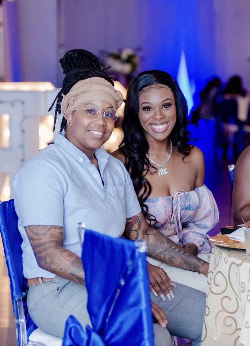 Terica and Brandy at a formal dinner