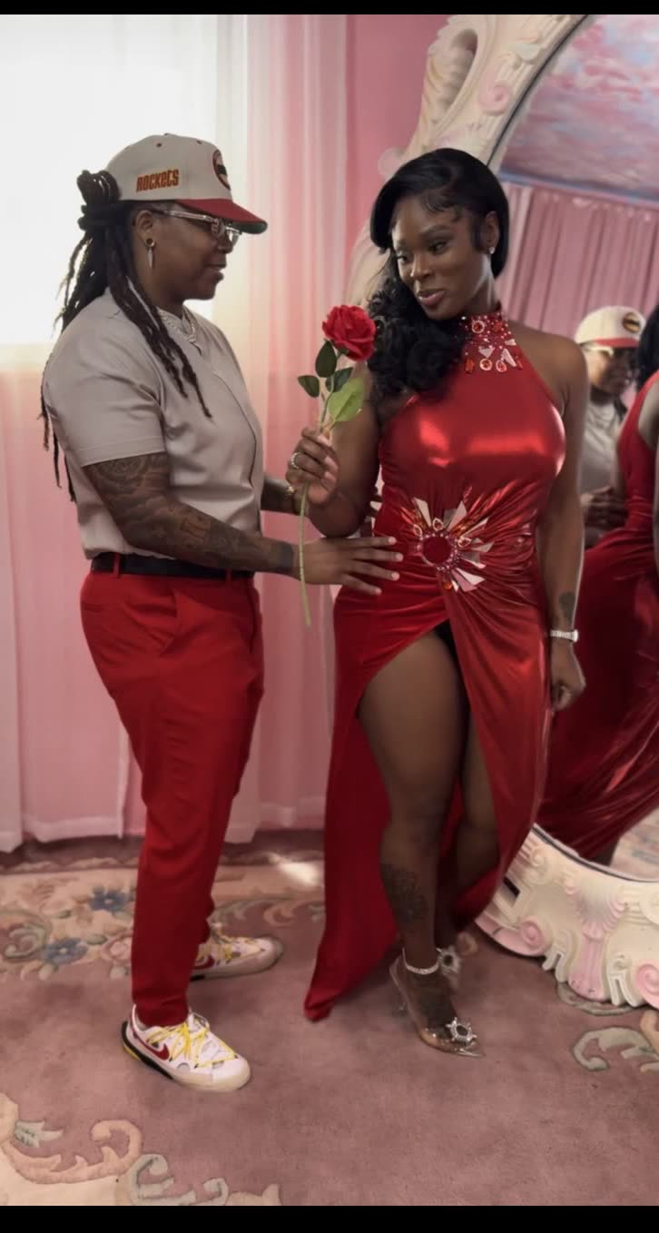 Terica and Brandy together, Brandy holding a single red rose